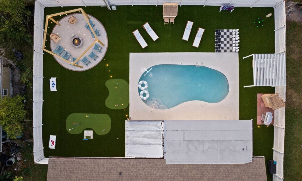 Clearwater House | Clearwater ICONIC Heated Pool Home, Mini Golf, Sleeps 11