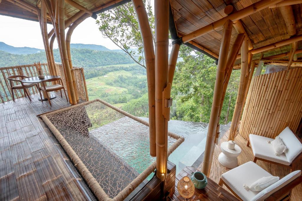 Melayang Villa | Cliffside Bamboo Treehouse with Heated Pool and View