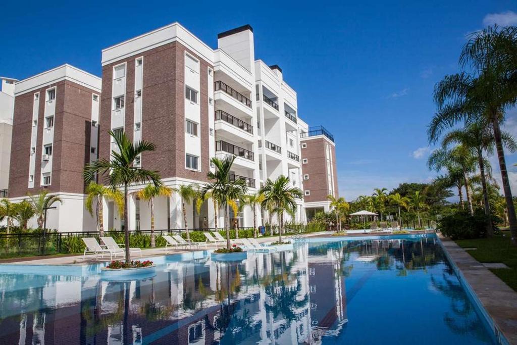 Abraao Apartment | Cobertura Beira Mar com Piscinas, Academia, Quadra de Tênis e 4 vagas de garagem