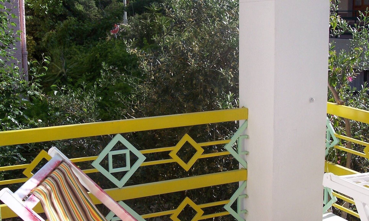 Cala Gonone Apartment | Comfortable apartment, 400 meters from the sea, balcony, in house with garden.