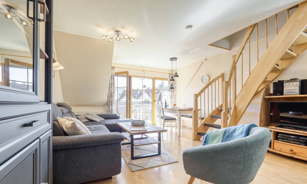 Zingst Apartment | Comfortable Windrose vacation apartment with balcony, pool and garden view in Zingst -