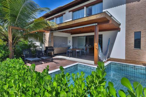 Acu da Torre House | Condominio Frente Mar 3 suites com Ar Cond piscina e Hidro privativa