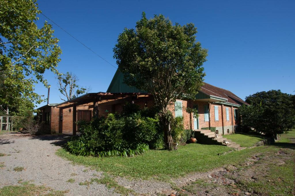 Farroupilha House | Conforto, história e arte - casa com calefação