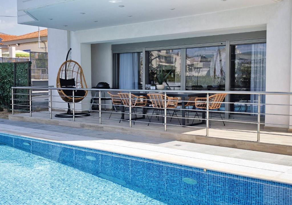 Voula Apartment | Costa Voula Poolside and Beach, Home Cinema