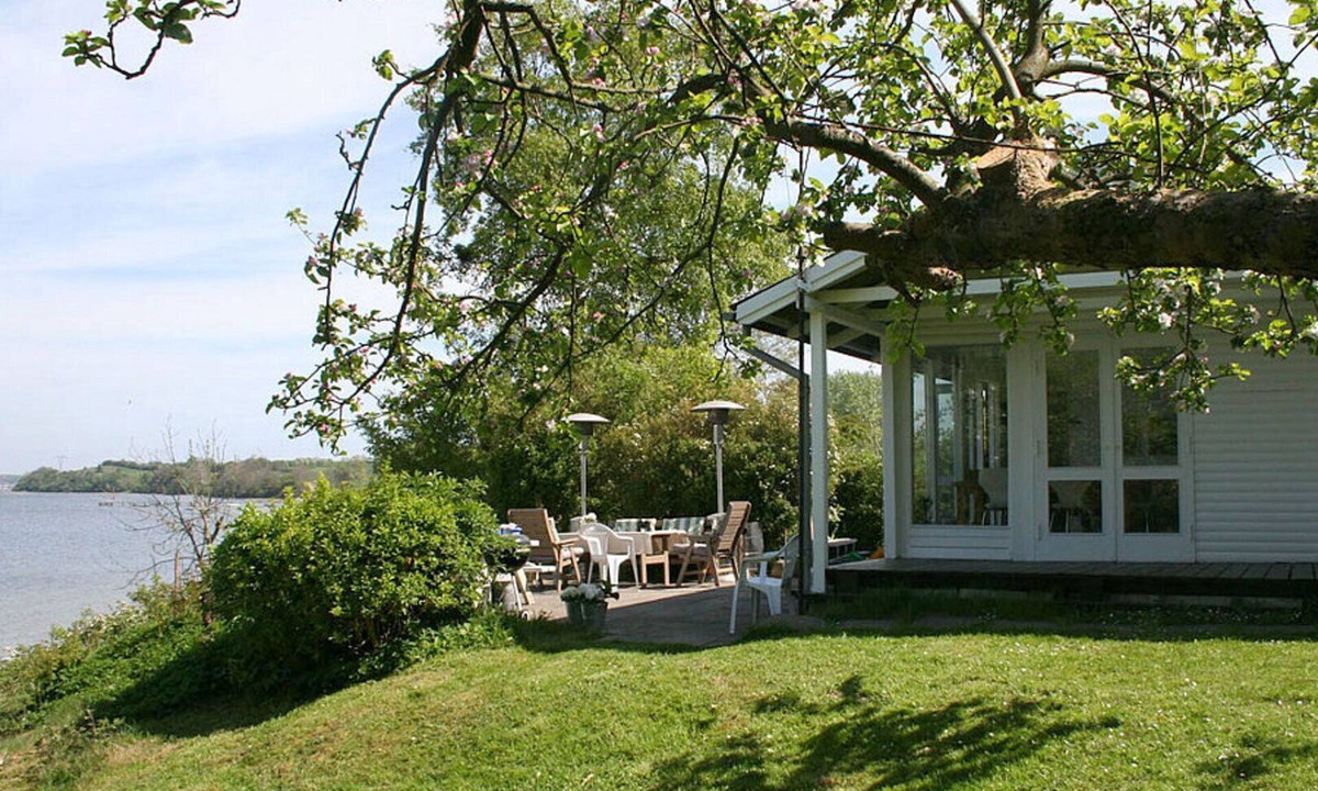Bjert House | Cottage on grassy plot with panoramic views of the water and outdoor Jacuzzi