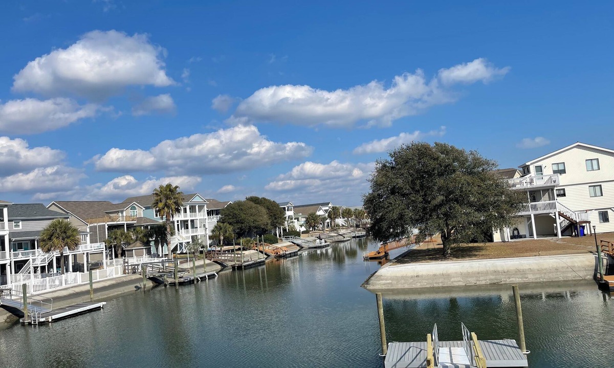 Ocean Isle Beach Cottage | Cozy 5BR-2.5BA Cottage on Canal, Private Heated Pool, Private Boat Dock