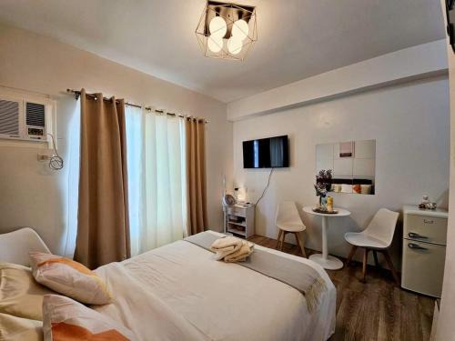 Bantud Hacienda Apartment | Cozy Condo unit Best Location at Lacson street