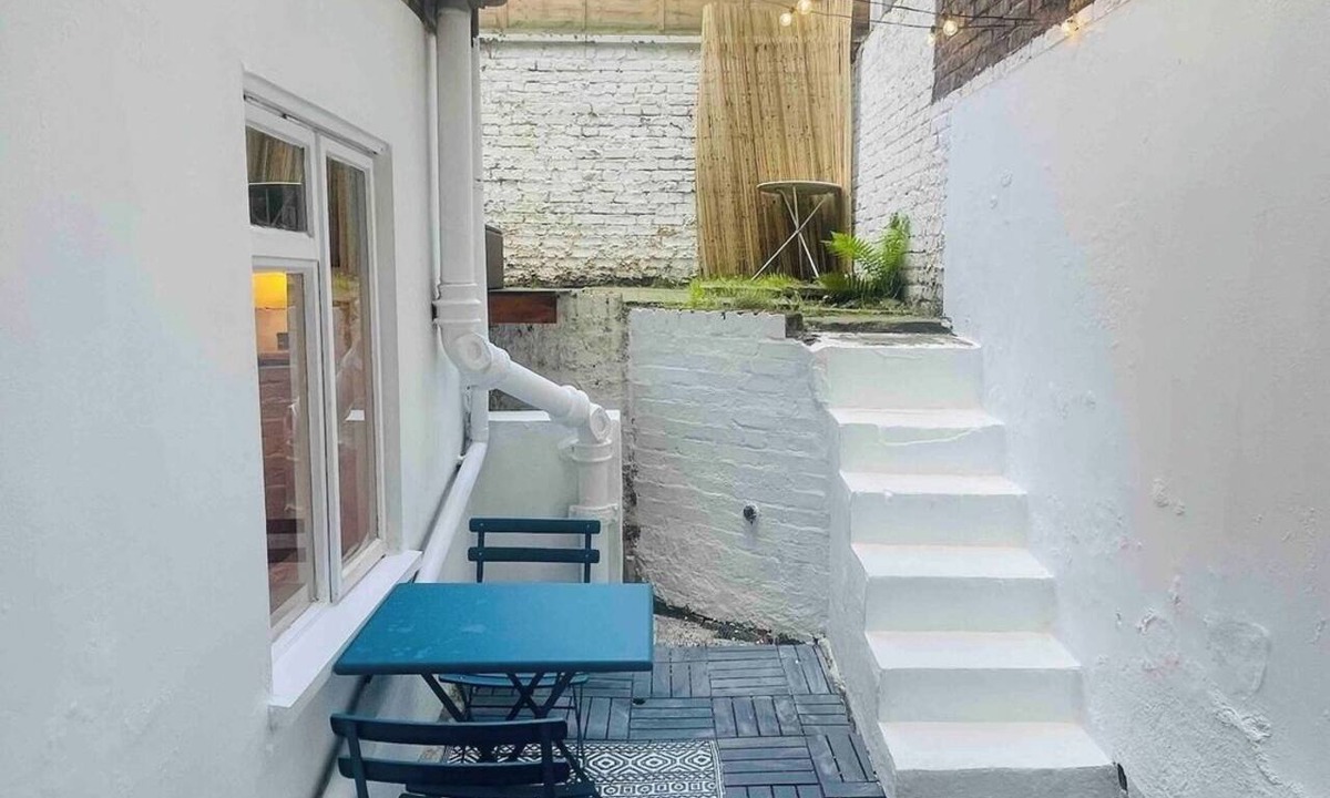 Kentish Town Condo | Cozy Garden Apartment with Wood Burner