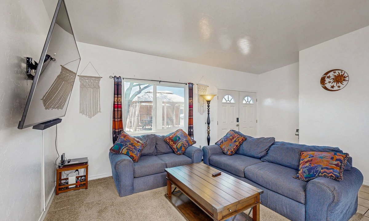 Campus Farm House | Cozy home with nice backyard, southwestern decor, & central location