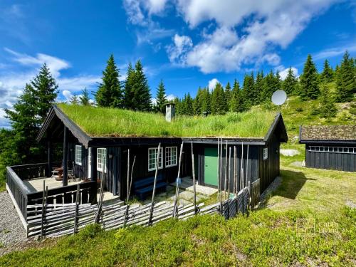 Ringsaker House | Cozy spacious cabin with sauna at Natrudstilen
