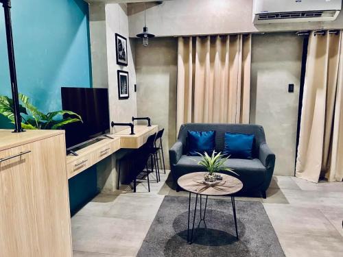 Kaunlaran Apartment | Cozy Spacious Pet Friendly Unit with Netflix Pool Gym
