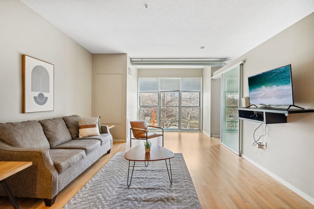 Mill District Apartment | CozySuites Mill District with pool, gym #08