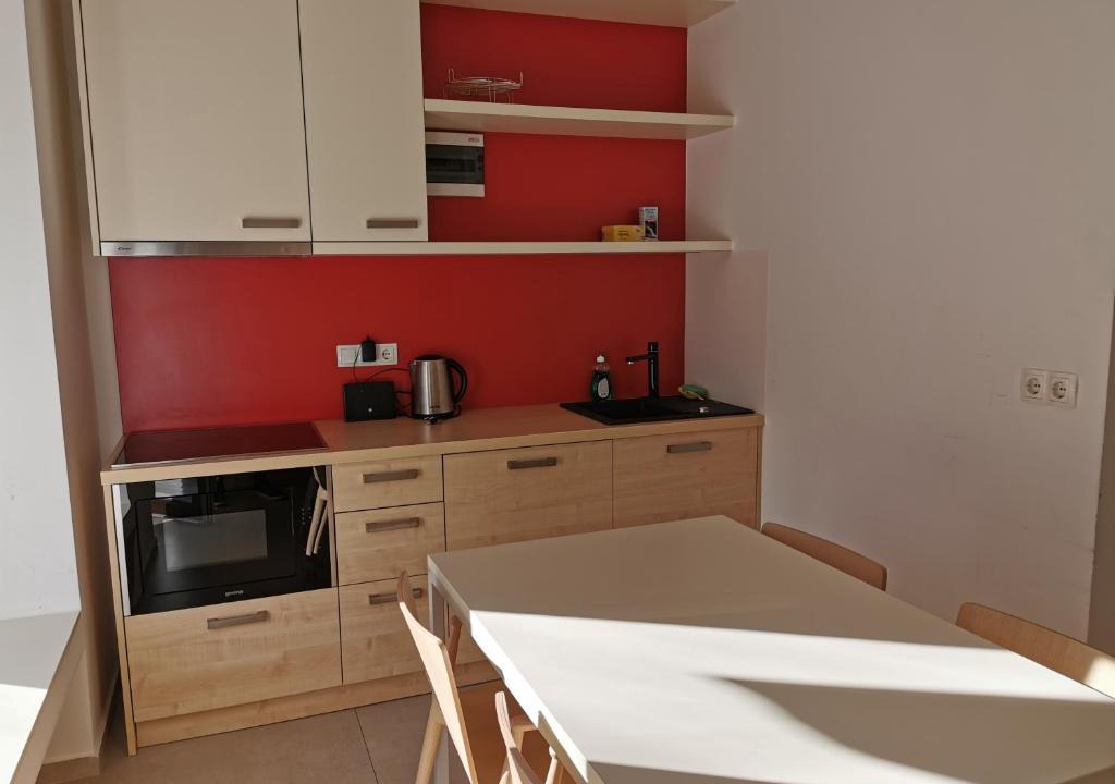 Ljubljana City Centre Apartment | Cube studio by the river (with free bike rental)