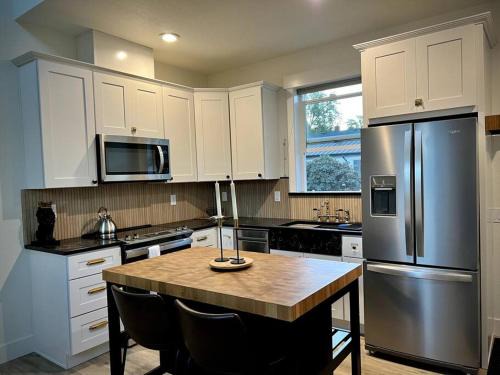 Grant House | Custom Built Cottage in Downtown with Pool