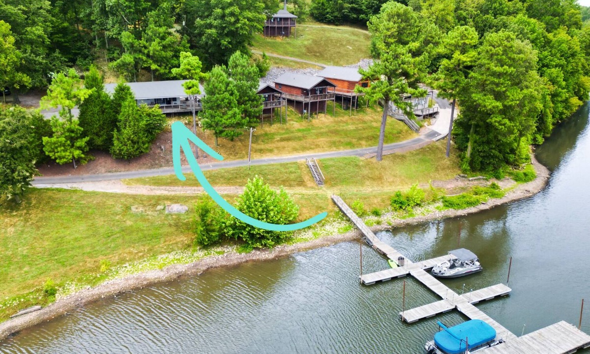 Eddyville Cabin | Deckside Haven 2 - Tiny living space with a queen and full size beds overlooking Lake Barkley.