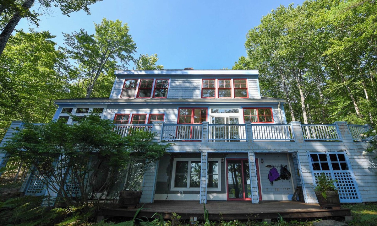 Harrison House | Designer Lakefront Retreat with Panoramic Sunset Views