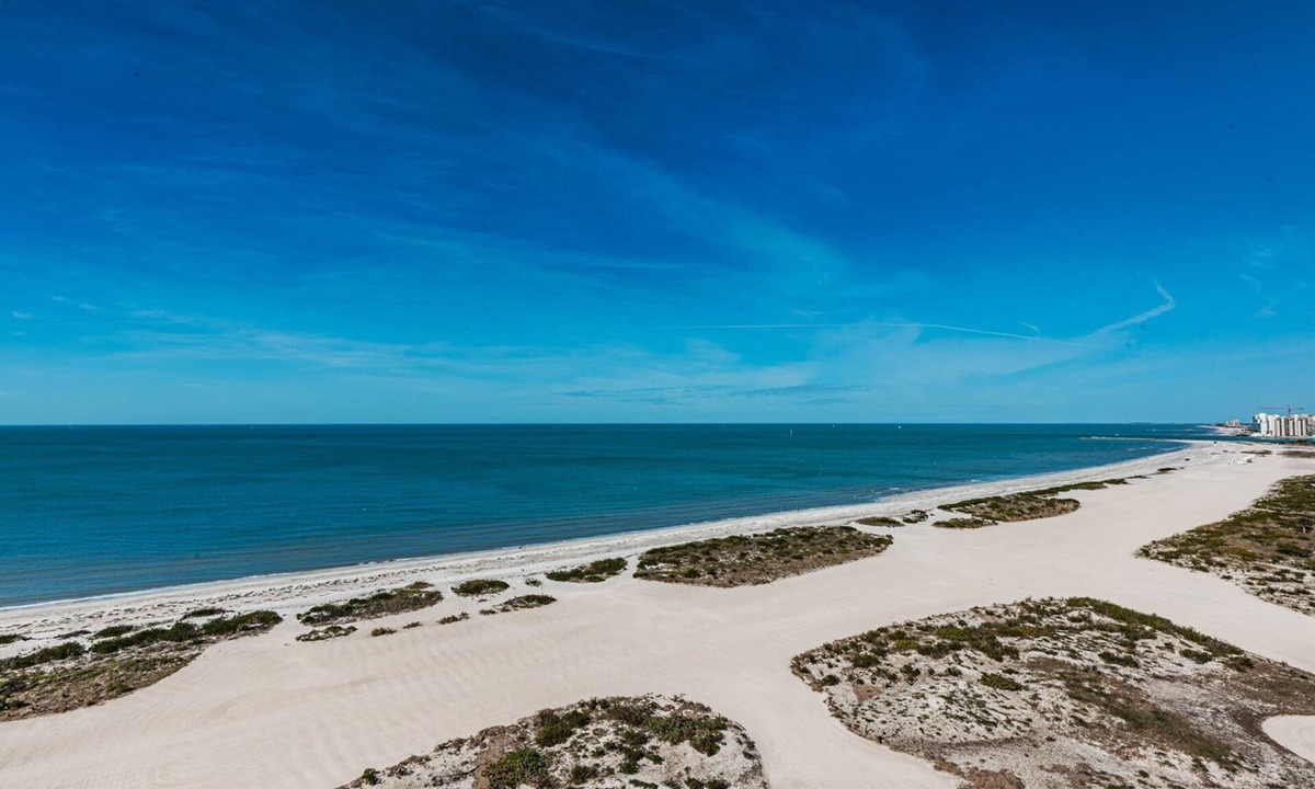 Sand Key Condo | Direct Gulf Front Southern Exposure corner unit with TWO BALCONIES! UNOBSTRUCTED Breathtaking Million Dollar Views & Magnificent Sunsets! Located in Lighthouse Towers, Clearwater Beach ~