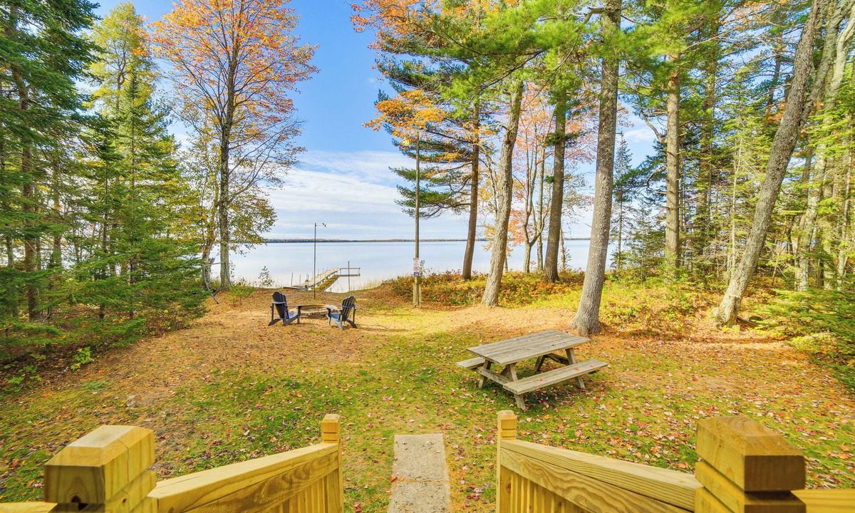 Gould City Cottage | Dock & Fire Pit: Lakefront Cottage in Gould City!