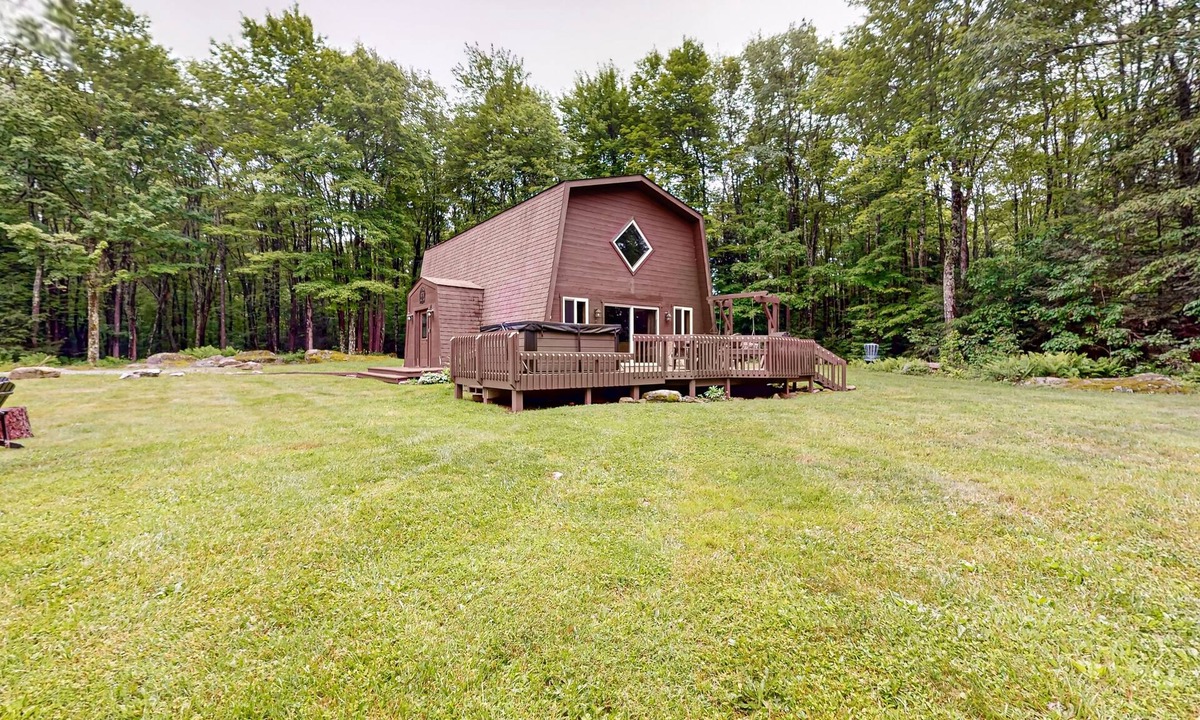 Accident House | Dog-friendly cabin with firepit, deck, private hot tub, fireplace