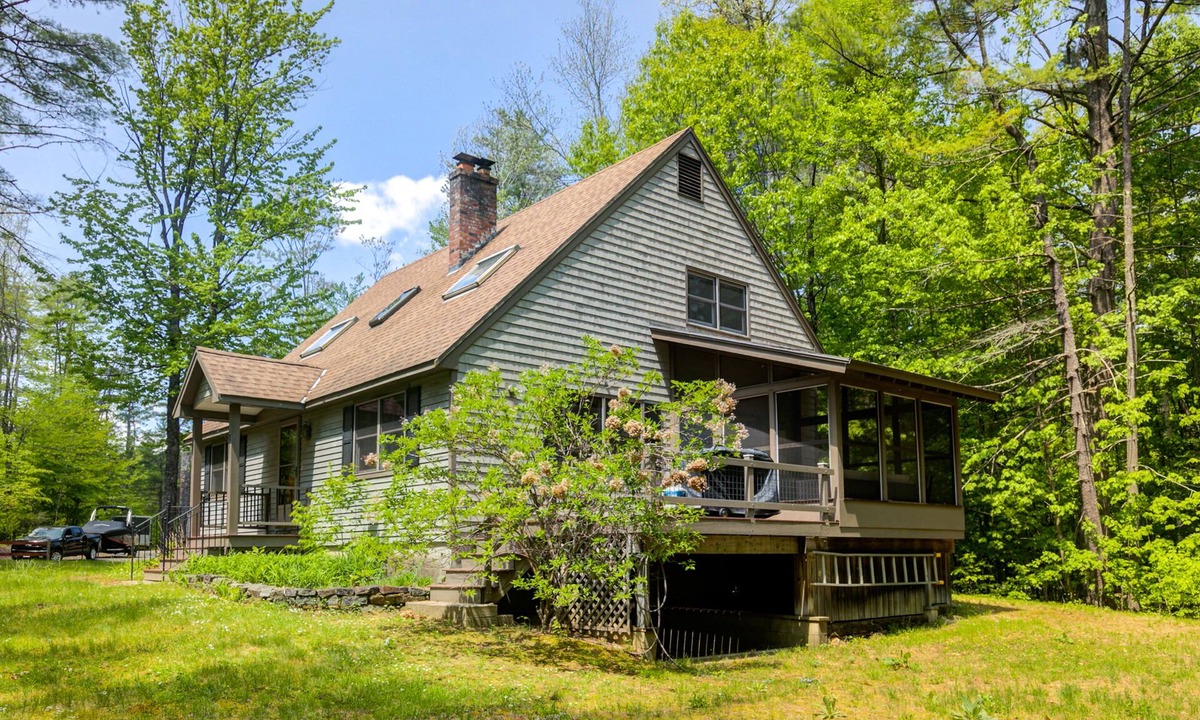 The Bluffs House | Dog-friendly home with firepit, screened porch, deck & association beach