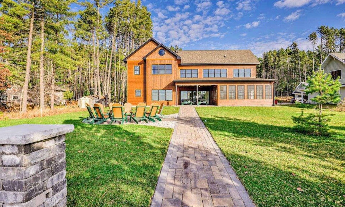 St Germain House | Dog-friendly lakefront home with firepit, 2 grills, fireplace, dock, & kayaks