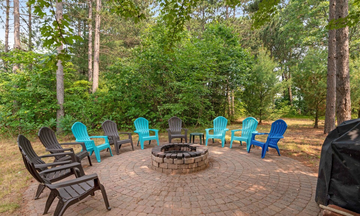 Necedah House | Dog-friendly riverfront retreat with huge yard, deck, grill, firepit, & kayaks