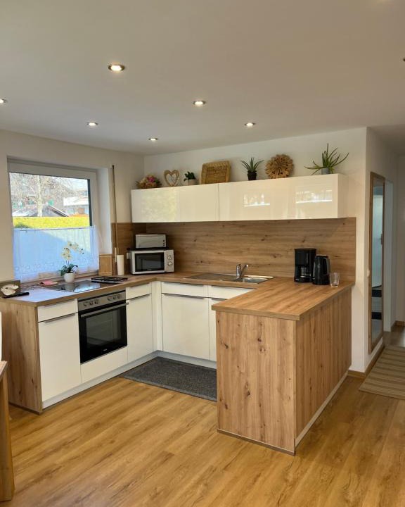 Garmisch-Partenkirchen Apartment | Doppelhaushälfte Zugspitzblick mit privatem Garten