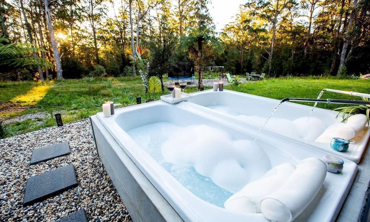 Deer Vale Cabin | Dorrigo accommodation, twin outdoor baths under the stars,120 ac. river & walks