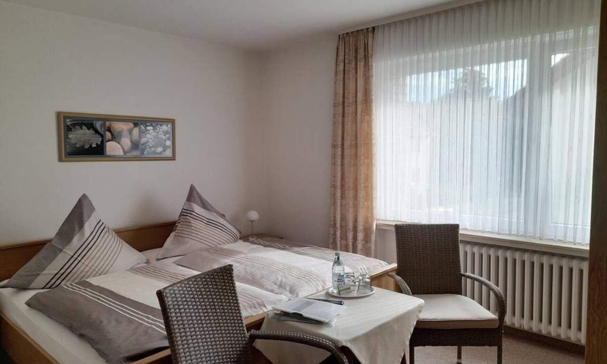 Bad Driburg Apartment | Double room, bathroom, WC - Ferienwohnung Iburgblick GbR