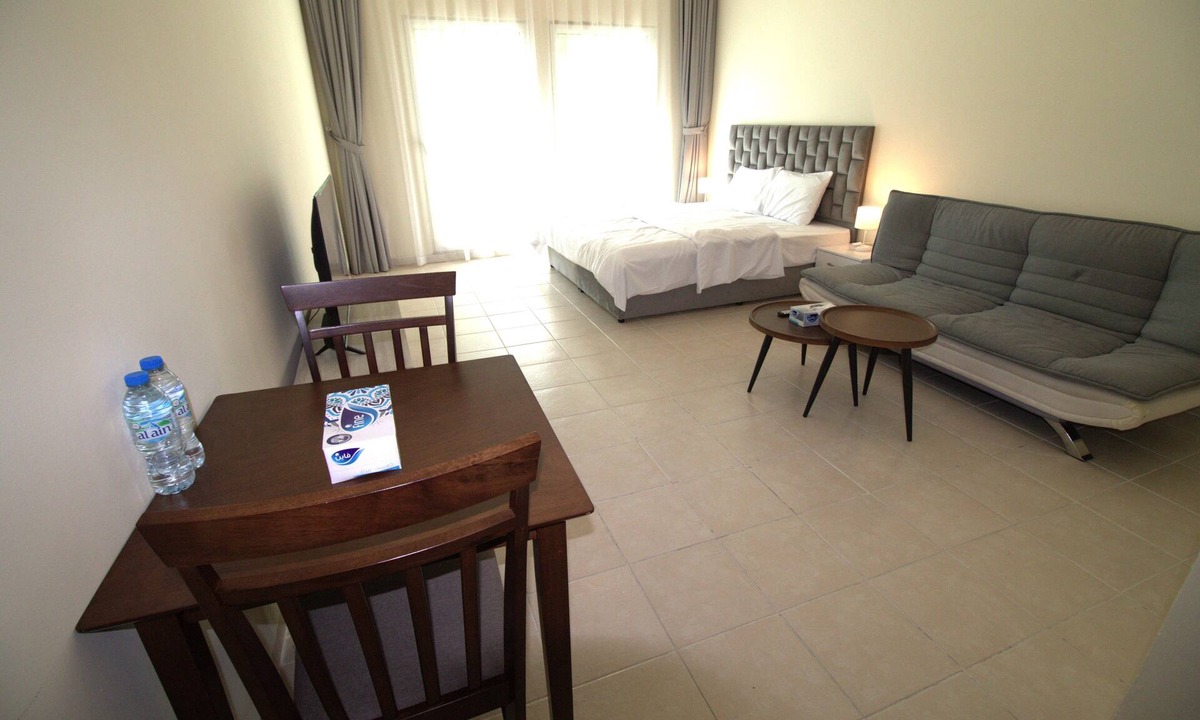 Discovery Gardens Apartment | DRUVYA HOLIDAY HOMES, Bld DG194, Street No,2 Discovery Gardens, Close to Metro