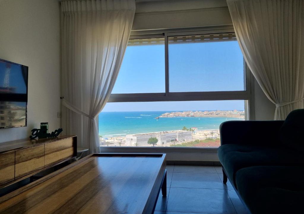 Acre Apartment | Ducks on the beach