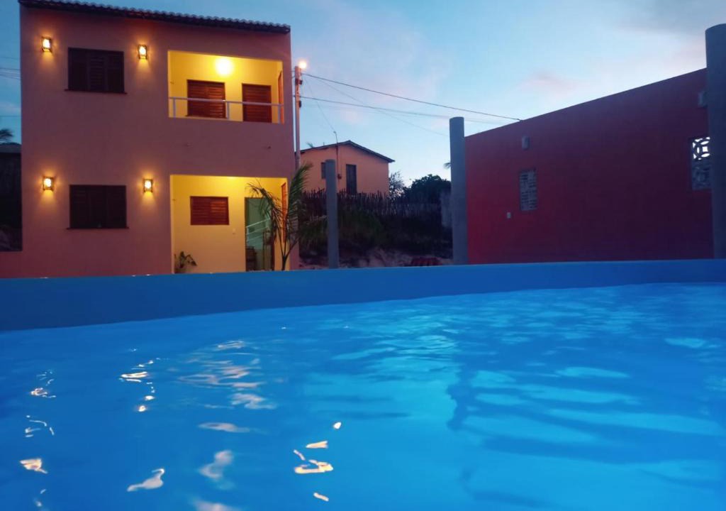 Aracati House | Duplex de 2 quartos com ar condicionado , piscina e estacionamento