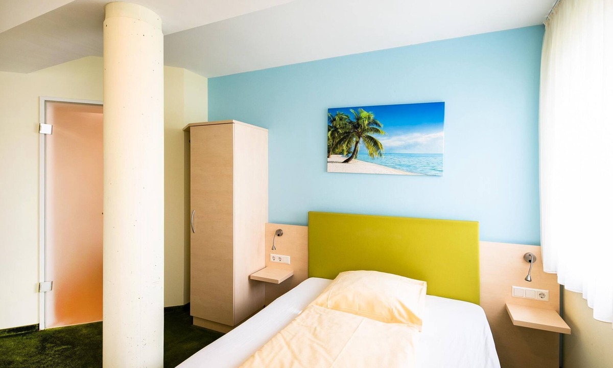 Ehingen Apartment | Einzelzimmer mit Flatscreen und WLAN