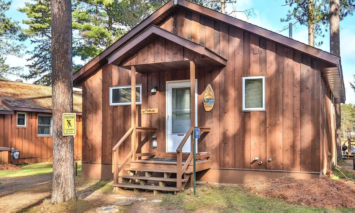 St Germain House | Elbert’s Resort lakeside cabin with dock and Timber’s bar and grill on site!