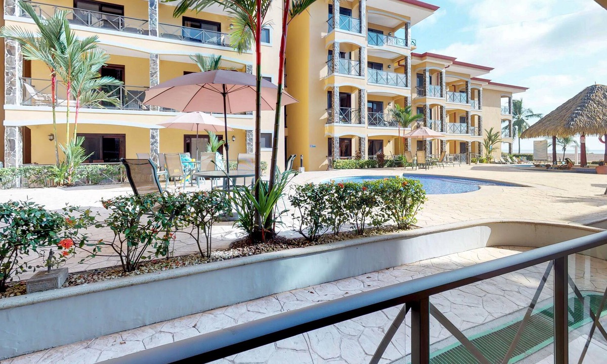 Barrio Los Villalobos Apartment | Elegant beachfront condo with WiFi, AC, pool, upscale fixtures, & ocean views