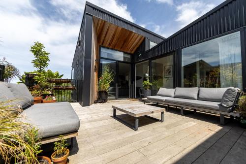 St. Clair Villa | Elevated architectural home with stunning sea views