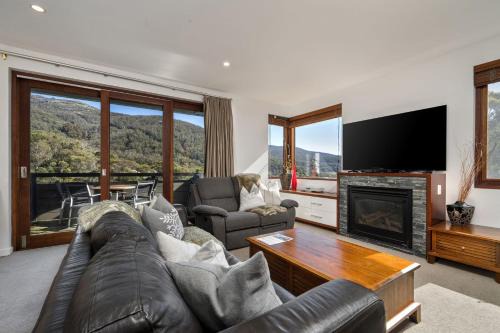 Thredbo Apartment | Elevation 2 bedroom with guest room gas fire and mountain views