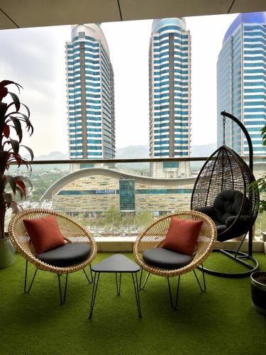 Blue Area Hotel | Elysium Tower Serviced Apartments Facing Centaurus Mall Islamabad