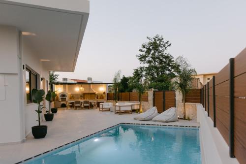 Skouloufia Villa | Emerald Harmony Villa with Private Pool & Jacuzzi by Rentado