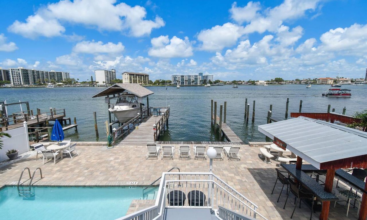 Bay Esplanade Apartment | Enchanted Inn Suite #6: Waterfront, Pool, Fishing Dock, Boat Docks & Tiki Bar!
