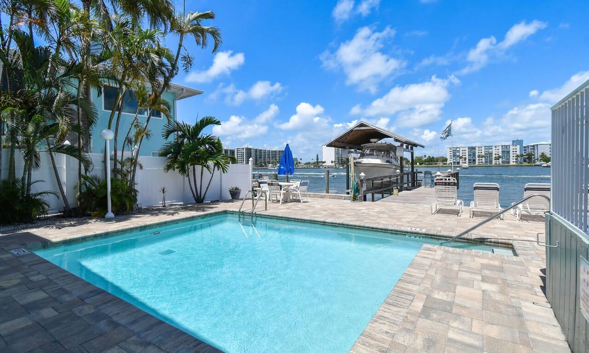 Bay Esplanade Apartment | Enchanted Inn Suite #4: Waterfront, Pool, Fishing Dock, Boat Docks & Tiki Bar!