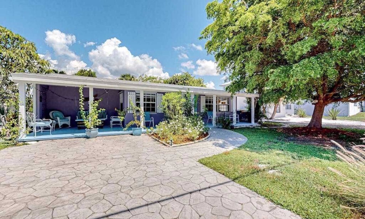 Isles of Capri House | Enchanting dog-friendly beach bungalow with patio, fireplace, deck, AC, & W/D