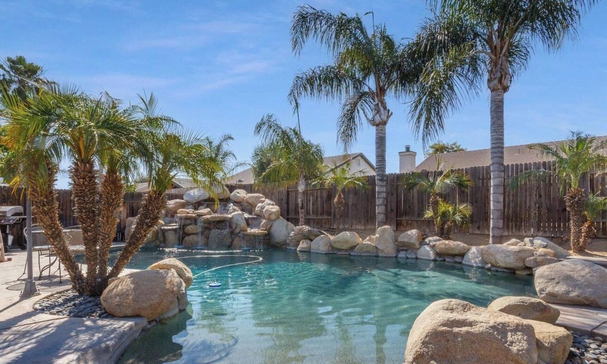 Greenacres House | Enjoy a Mini Oasis w/Pool Waterfall 4bd/2ba Home!