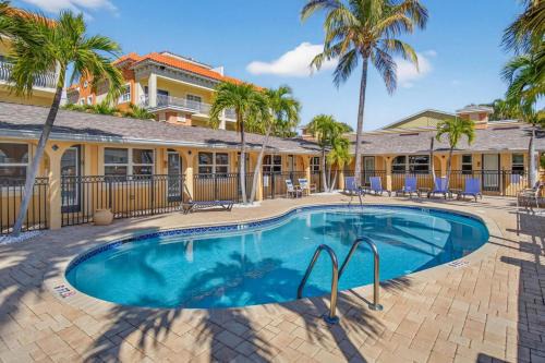 Redington Shores Apartment | Enjoy Sunny Days by the Pool and Beautiful Sunset Beach Walks at Coconut Villa's Suite 10!