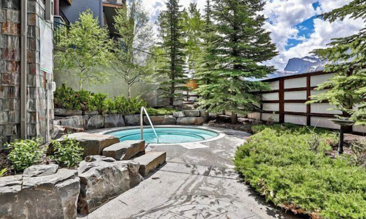 Canmore Condo | Enjoy this Stunning Condo with Hot Pools, Steam Room, Onsite Spa and Restaurant