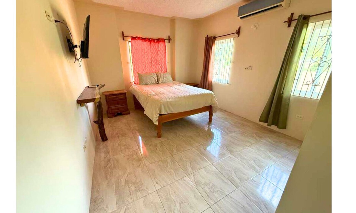 Salt Gut Apartment | Euphoria suite is a two bedroom, one bathroom unit with a private kitchen, living room, and laundry room. Perfect for groups or two traveling together seeking extra space, privacy, and elegant Caribbean comfort!
