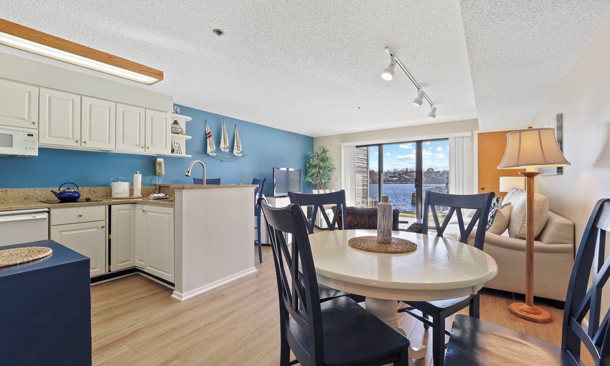 Charlevoix Condo | EWI 117A Waterfront Access | Pool, Hot Tub, Sauna | Sleeps 4