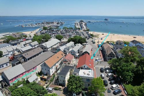 Commercial Street Apartment | Expansive Deck with Waterviews and views of Ptown Monument
