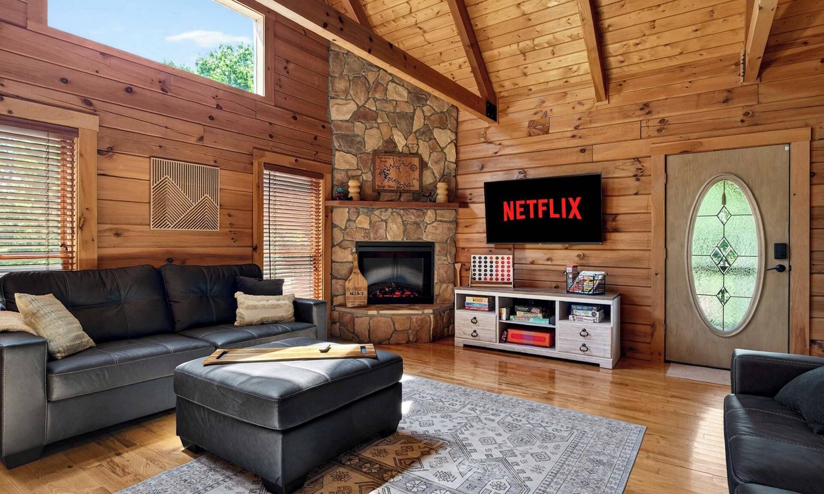 Leitchfield House | Expansive lakefront cabin with game room and yard!