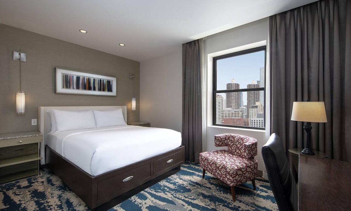 Near North Side Hotel | Experience Comfort in Eco-friendly Room w/Earth Tone Furniture